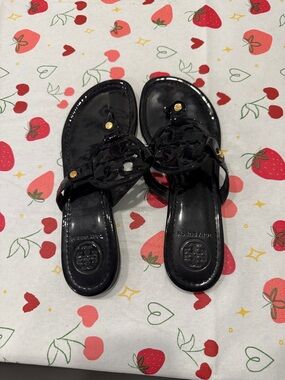Tory Burch Black Patent Miller Logo Thong Sandals with Gold Accents